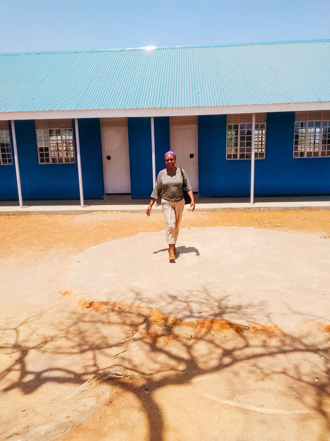 Rosemary walking in front of new block