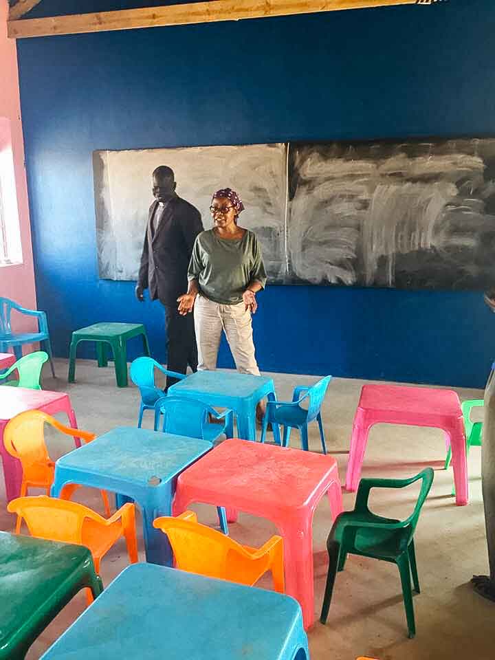 Inside one of the new classrooms with Pastor Simon, our Church Relations Coordinator.