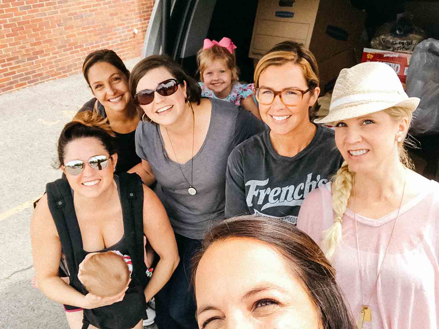 Friends of Tusculum unloading and delivering Teacher Appreciation goodie bags.. even with kids in tow!