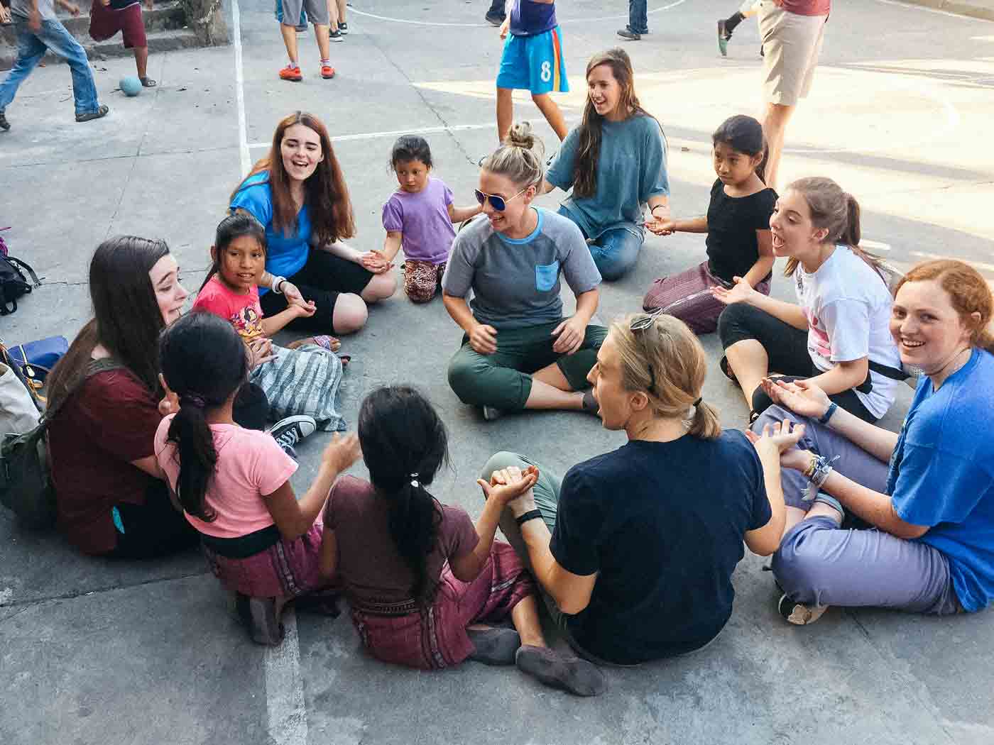 FSM girls play a game with the girls at the elementary school