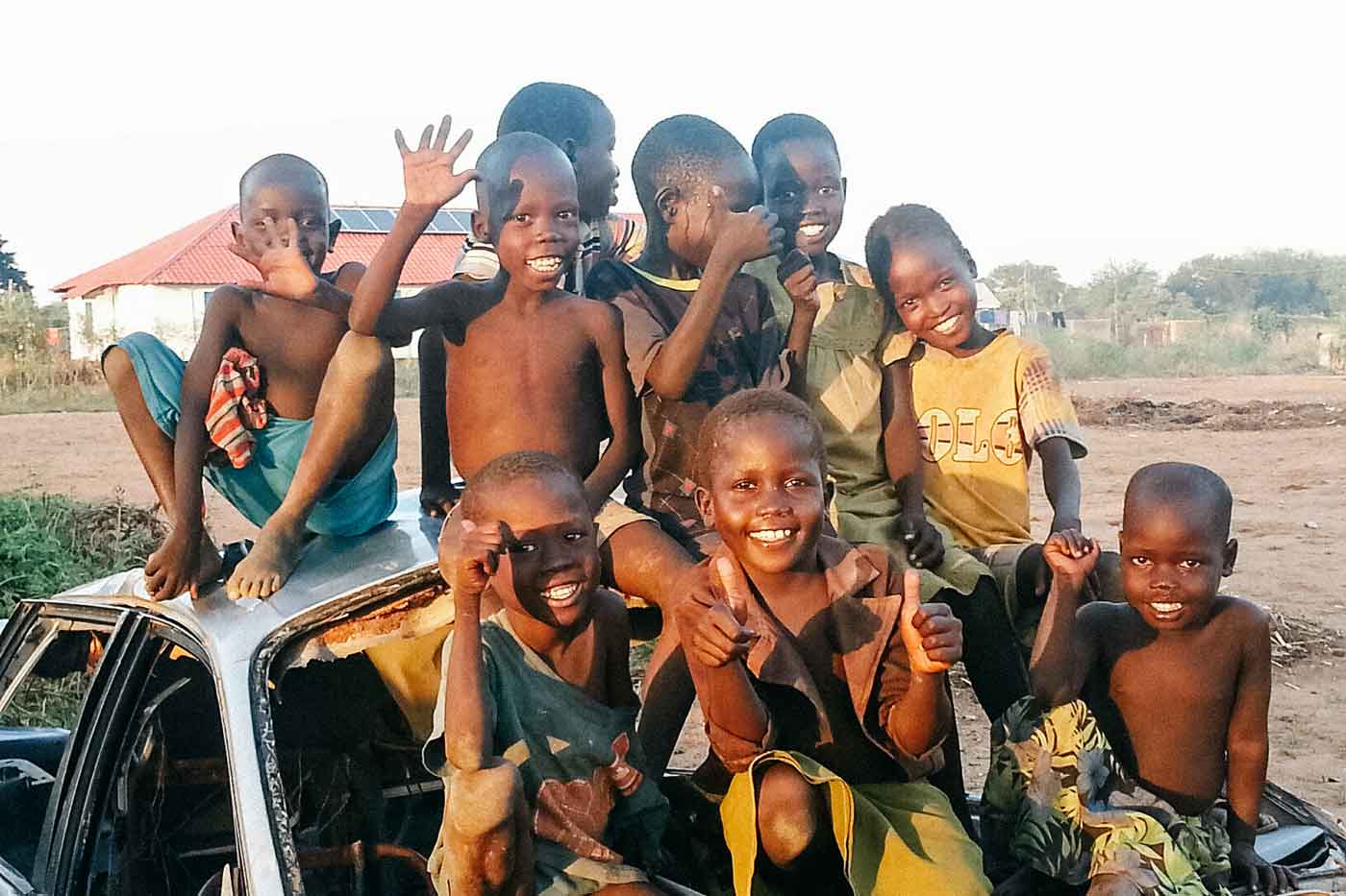 Happy children enjoying a ride in the truck