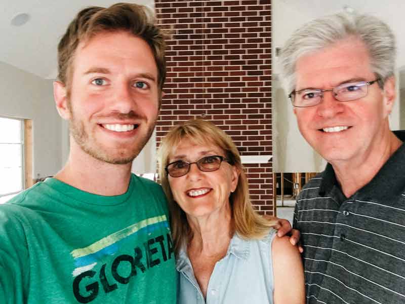 My parents and I in our house