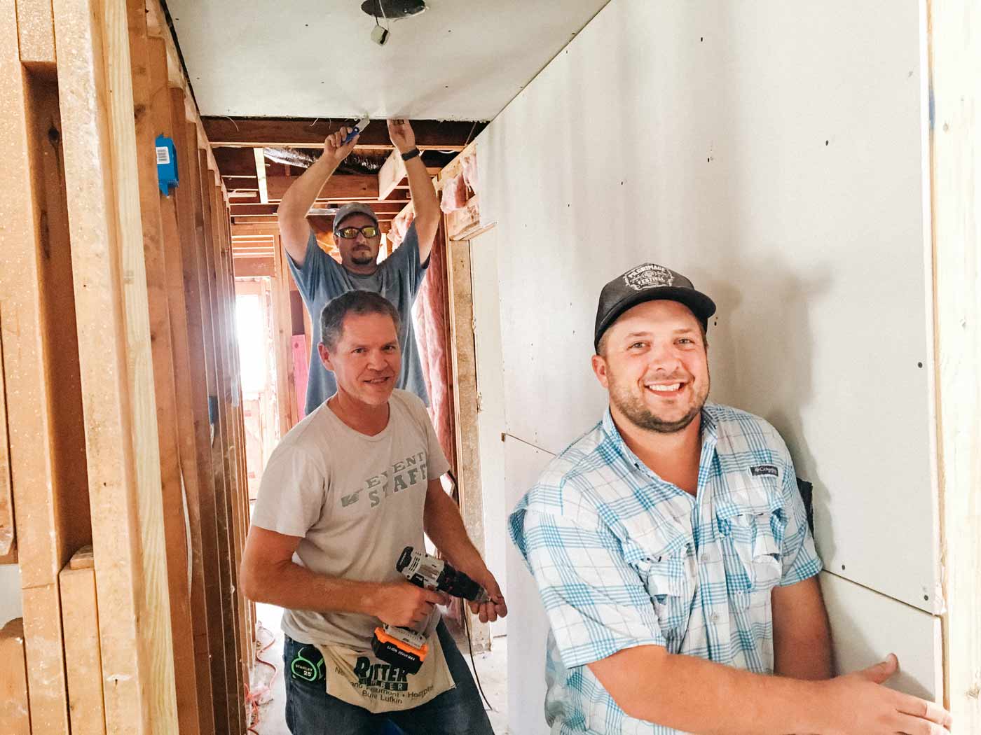 James, William, and Jarrod working on Josh's home